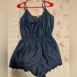Cute dark denim ruffle romper.